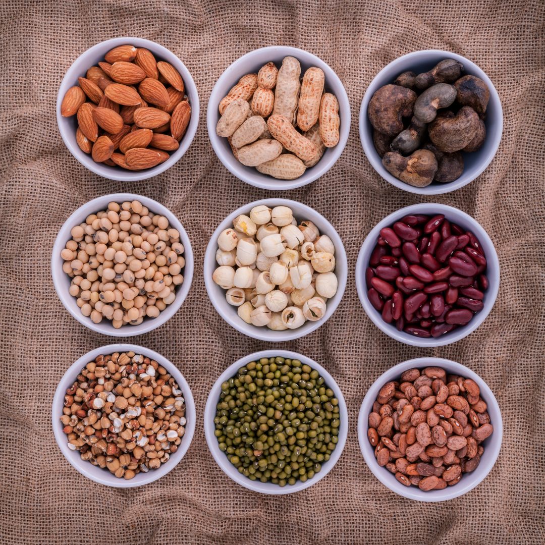 Fibre-rich foods suitable for a PCOS-friendly diet, including oats, seeds, berries, lentils and vegetables.
